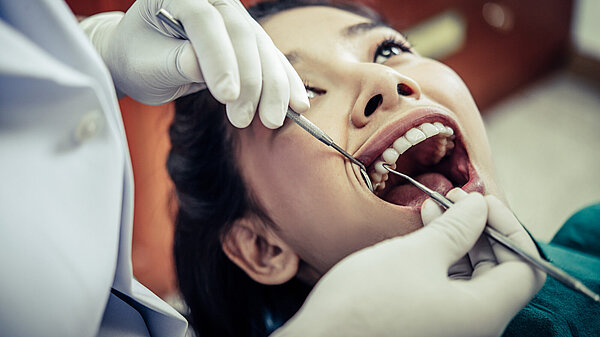 Dentist with patient